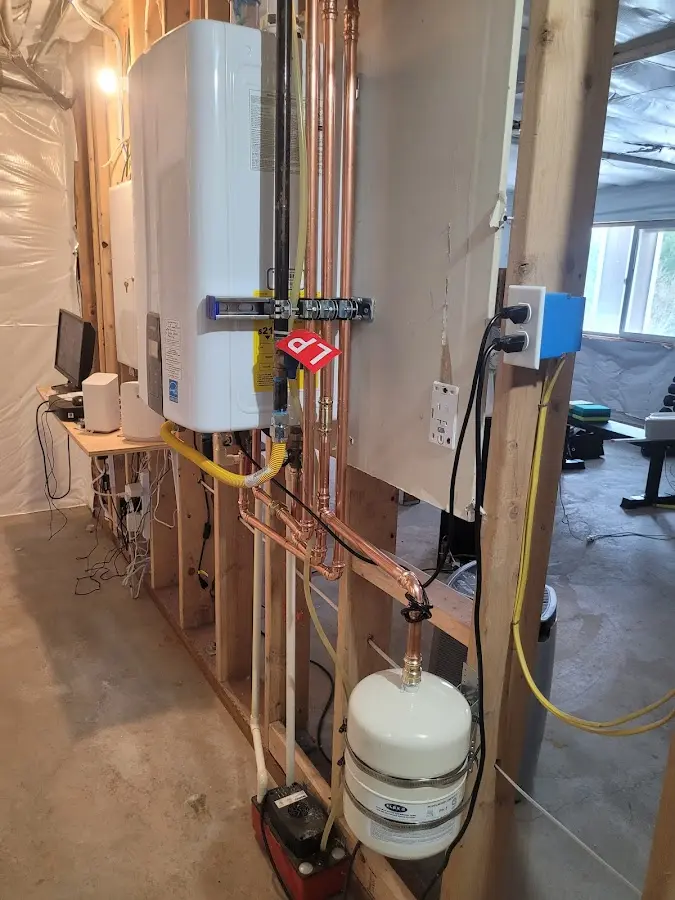 Licensed plumber repairing a kitchen sink in Wappinger